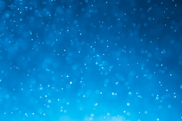 Dark blue abstract backgrounds with bokeh.