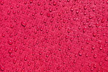 crimson red waterproof material, rip stop cloth with drops of water
