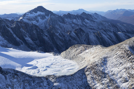 Aerial view of snow covered mountains