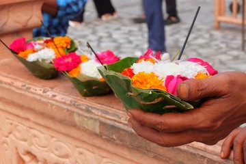 Naklejka na ściany i meble Flowers for Ganga Aarti ceremony in Parmarth Niketan ashram at sunset. Rishikesh is World Capital of Yoga, has numerous yoga centres that also attract tourists