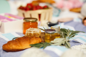 honey honeycomb on wooden plate