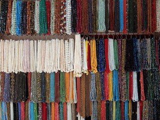 Glass and stone beads on the market