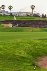 Golf course along rocky coastline. Tenerife, Spain.