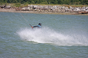 kitesurfer riding toeside
