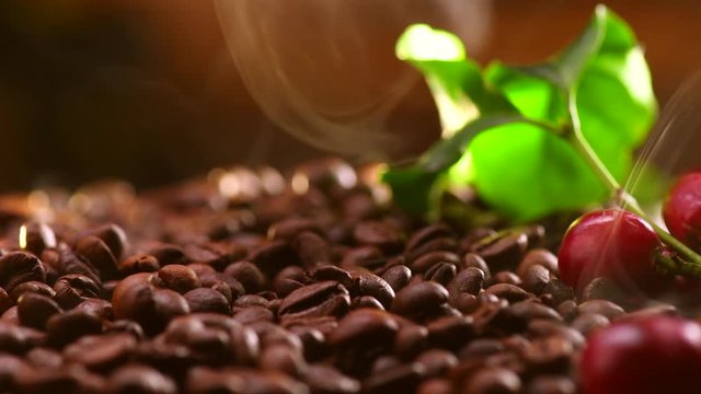 Coffee. Roasted steaming coffee beans closeup. 4K UHD video 3840X2160
