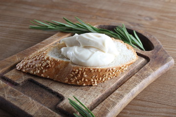 processed cheese bread on a wooden background