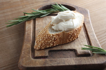 processed cheese bread on a wooden background