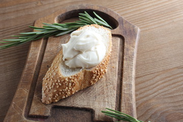 processed cheese bread on a wooden background