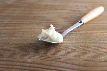 processed cheese in a spoon background