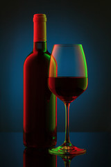 Coloful wineglass on table.