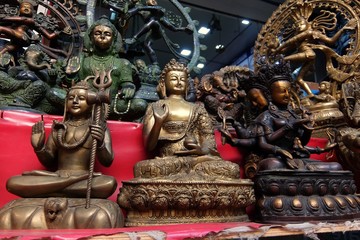 Fototapeta premium Small bronze statuettes on the street market in Rishikesh.