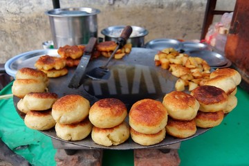 Rishikesh, India. Aloo tikki (fried potato cutlets), famous indian street food.