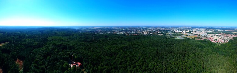Obraz premium Panorama of aerial view on the city Koszalin and forest
