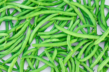 Pile of green beans, photographed on blurred background, natural fresh product