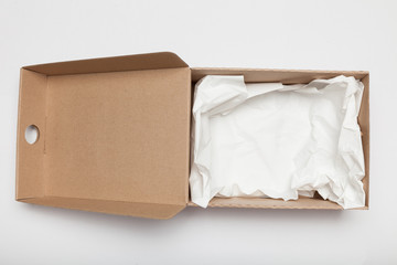 Open delivery carton box, corrugated cardboard. Container packing. Copy space for text.