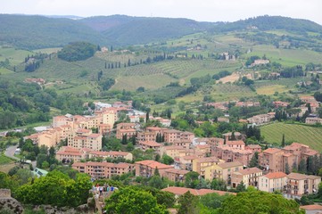 Fototapeta na wymiar San Gimignano known as Town of Fine Towers - Famous medieval hill town in Siena, Tuscany, Italy
