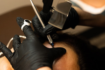 Permanent makeup application. Microblading eyebrow tattoo. Natural, gorgeous eyebrows