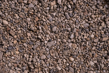 pattern texture of small white and Grey  pebbles gravel rocks and stones  background