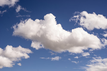 white big cloud on clear blue sky background