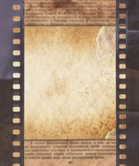 Obraz premium Vintage background with retro paper, newspaper and old film strip