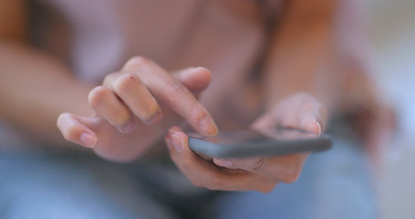 Woman use of mobile phone