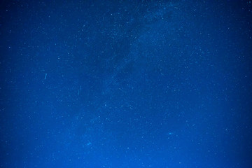 Obraz premium Dark blue night sky with many stars, galaxy background