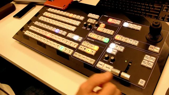 Multi camera production system on television set. Professional man working on network event. Equipment to create show