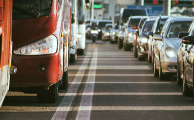 Traffic jam on busy road vehicles in row