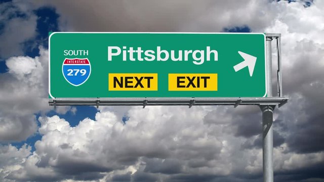 Pittsburgh Pennsylvania Freeway Exit Sign with Time Lapse Clouds