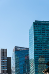 Low angle view of modern office buildings against sky in New Yor