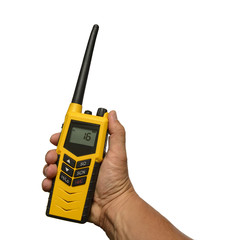 Portable VHF radio, in hand, isolated on white
