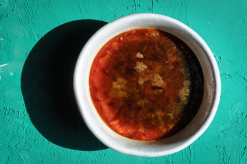 Coffee ice in a metal bowl on the table. Granita