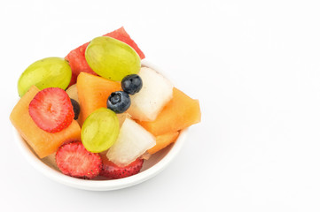 Colorful fruit salad with copy space