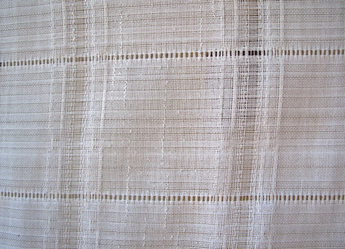 Tela de visillo color blanca.