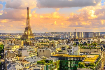 Fototapeten Paris sunset skyline aerial view from top of Arc de Triomphe on Champs Elysees street. Distant Tour Eiffel tower Landmark in Paris, France, Europe. © bennymarty