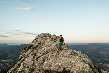 Guy trekking in the mountains