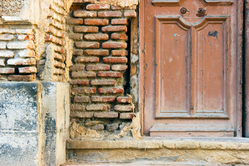 Old wooden door closeup with vintage details.