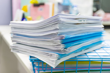 stack of papers documents on file cabinet in Office, business concept.
