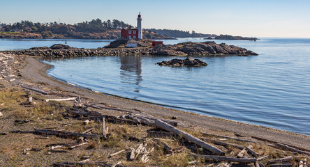 Lighthouse with calm bay