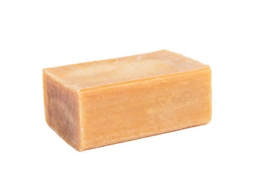 Brick of brown common soap isollated on white background