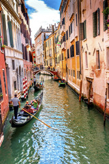 Gondola Touirists Colorful Canal Bridge Venice Italy