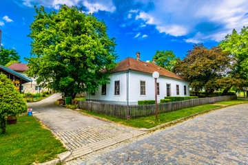 Fototapeta na wymiar Kumrovec scenery Zagorje region. / Scenic view at picturesque colourful town Kumrovec in Zagorje region, Northern Croatia travel destination.