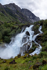 Fototapeta premium Small waterfall in Norway. Briksdalsbreen.