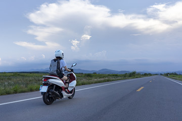 Girl riding a scooter