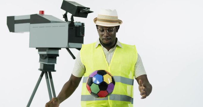 Video operator dancing with a ball