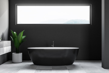 Obraz na płótnie Canvas Dark minimalistic bathroom interior, window
