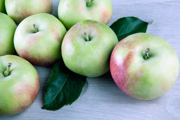 fresh apples on a gray wooden background