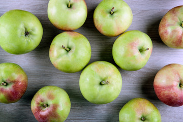 fresh apples on a gray wooden background