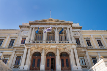 Fototapeta na wymiar Facade of the neoclassical city Hall by Ernst Ziller in Miaouli square, Syros island, Cyclades, Greece