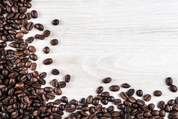 coffee beans on a gray wooden background